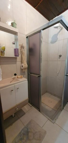 Casa em Porto Alegre, no bairro Ponta Grossa, com 3 dormitório(s), e 3 banheiros, à venda. — foto 15