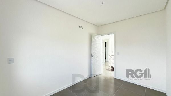 Casa Condominio em Porto Alegre, no bairro Campo Novo, com 3 dormitório(s), e 3 banheiros, à venda. — foto 28