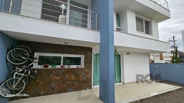 Casa em Porto Alegre, no bairro Hípica, com 3 dormitório(s), e 3 banheiros, à venda. — foto 29