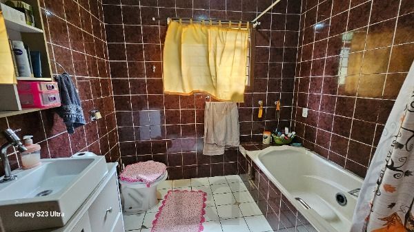 Casa em Porto Alegre, no bairro Belém Novo, com 3 dormitório(s), e 3 banheiros, à venda. — foto 19