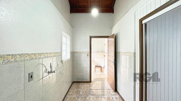 Casa em Porto Alegre, no bairro Guarujá, com 2 dormitório(s), e 2 banheiros, à venda. — foto 16