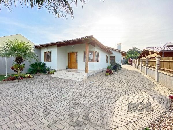 Casa em Porto Alegre, no bairro Belém Novo, com 3 dormitório(s), e 3 banheiros, à venda. — foto 4