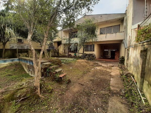 Casa em Porto Alegre, no bairro Cristal, com 4 dormitório(s), e 4 banheiros, à venda. — foto 40