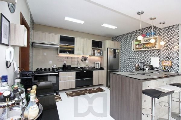 Casa em Porto Alegre, no bairro Hípica, com 3 dormitório(s), e 3 banheiros, à venda. — foto 10