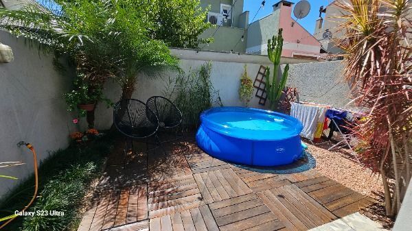 Casa em Porto Alegre, no bairro Hípica, com 3 dormitório(s), e 3 banheiros, à venda. — foto 13