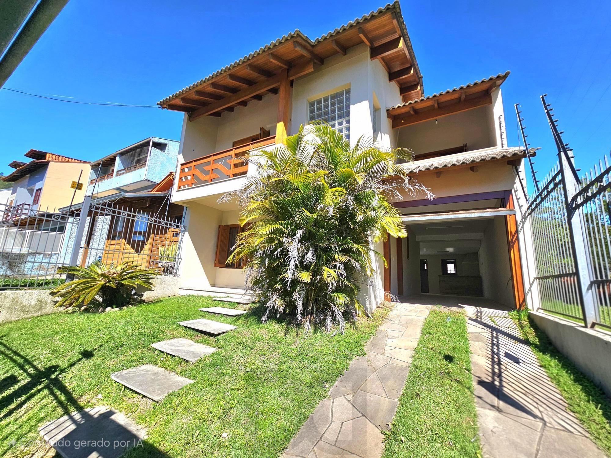 Sobrado 3 dormitórios com lareira, churrasqueira, piscina, 4 vagas garagem com 196,00m² de área construída no bairro Hípica ! — foto 1