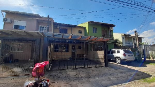 Casa em Porto Alegre, no bairro Hípica, com 3 dormitório(s), à venda. — foto 2
