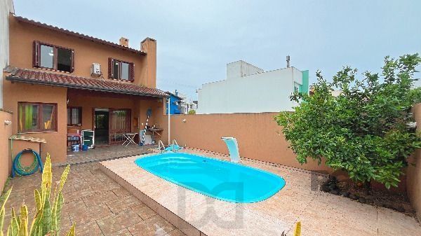 Casa em Porto Alegre, no bairro Hípica, com 3 dormitório(s), e 3 banheiros, à venda. — foto 17