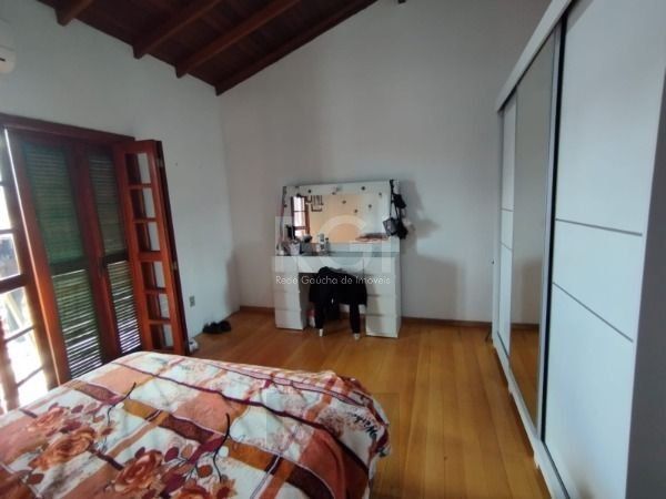 Casa em Porto Alegre, no bairro Hípica, com 3 dormitório(s), e 3 banheiros, à venda. — foto 20