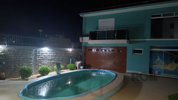 Casa em Porto Alegre, no bairro Hípica, com 3 dormitório(s), e 3 banheiros, à venda. — foto 24