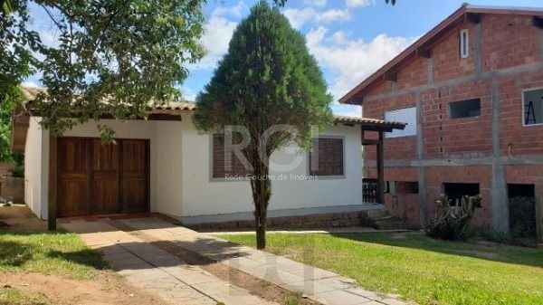 Casa em Porto Alegre, no bairro Hípica, com 2 dormitório(s), e 2 banheiros, à venda. — foto 1