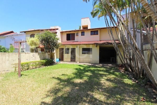 Casa em Porto Alegre, no bairro Ipanema, com 3 dormitório(s), e 3 banheiros, à venda. — foto 33