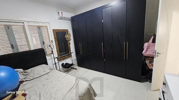 Casa em Porto Alegre, no bairro Hípica, com 3 dormitório(s), e 3 banheiros, à venda. — foto 13
