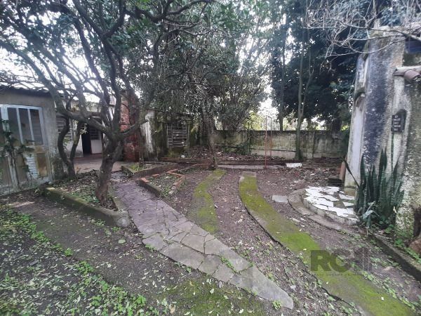 Casa em Porto Alegre, no bairro Cristal, com 4 dormitório(s), e 4 banheiros, à venda. — foto 33