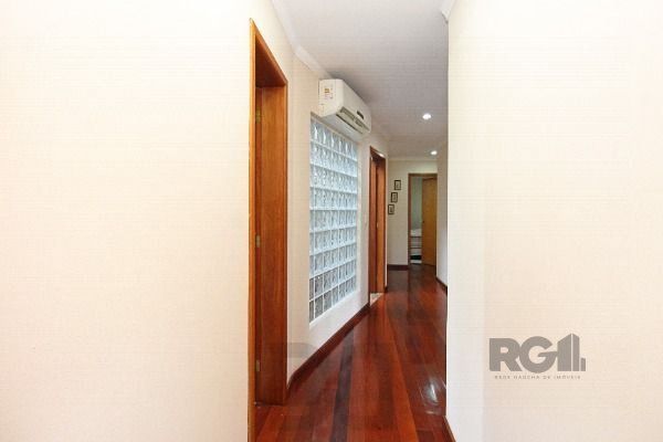 Casa em Porto Alegre, no bairro Belém Novo, com 3 dormitório(s), e 3 banheiros, à venda. — foto 9