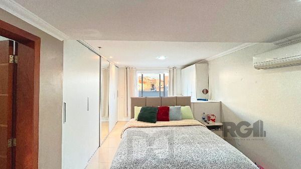 Casa em Porto Alegre, no bairro Hípica, com 3 dormitório(s), e 3 banheiros, à venda. — foto 35