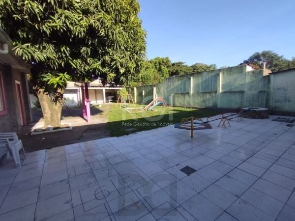 Casa em Porto Alegre, no bairro Belém Novo, com 5 dormitório(s), e 5 banheiros, à venda. — foto 18