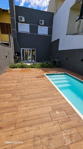 Casa em Porto Alegre, no bairro Hipica, com 3 dormitório(s), e 3 banheiros, à venda. — foto 8
