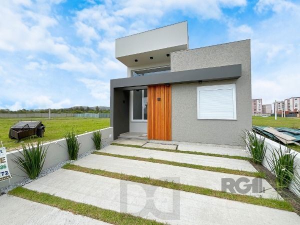 Casa Condominio em Porto Alegre, no bairro Hípica, com 3 dormitório(s), e 3 banheiros, à venda. — foto 3