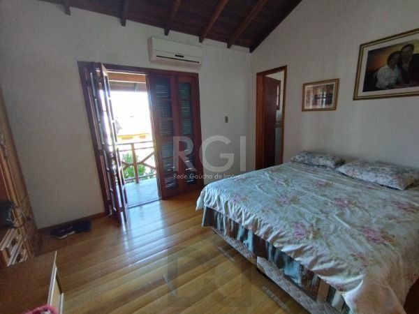 Casa em Porto Alegre, no bairro Hípica, com 3 dormitório(s), e 3 banheiros, à venda. — foto 23