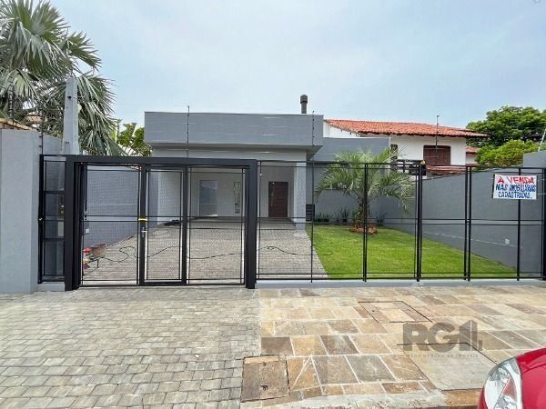 Casa em Porto Alegre, no bairro Ipanema, com 3 dormitório(s), à venda. — foto 1