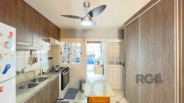 Casa Condominio em Porto Alegre, no bairro Cavalhada, com 3 dormitório(s), e 3 banheiros, à venda. — foto 16