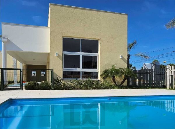 Casa Condominio em Porto Alegre, no bairro Hípica, com 3 dormitório(s), e 3 banheiros, à venda. — foto 28