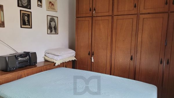 Casa em Porto Alegre, no bairro Santo Antônio, com 3 dormitório(s), e 3 banheiros, à venda. — foto 10