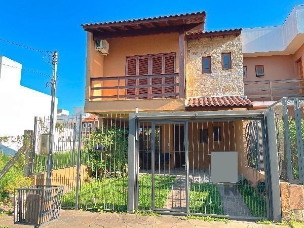 Casa em Porto Alegre, no bairro Hípica, com 3 dormitório(s), e 3 banheiros, à venda. — foto 1