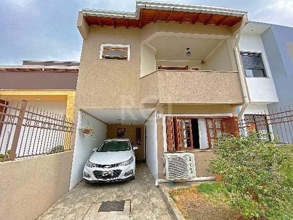 Casa em Porto Alegre, no bairro Hípica, com 3 dormitório(s), e 3 banheiros, à venda. — foto 3
