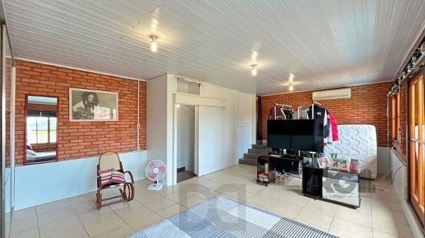 Casa em Porto Alegre, no bairro Guarujá, com 5 dormitório(s), e 5 banheiros, à venda. — foto 14