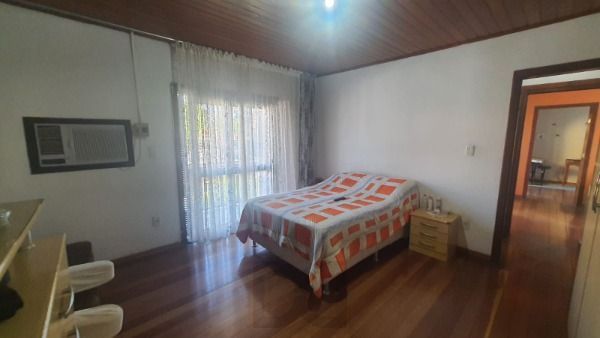 Casa em Porto Alegre, no bairro Nonoai, com 3 dormitório(s), e 3 banheiros, à venda. — foto 37