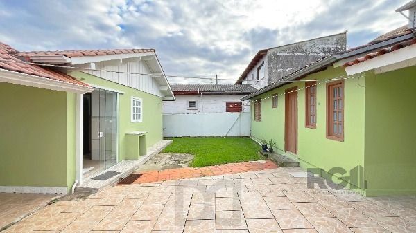 Casa em Porto Alegre, no bairro Guarujá, com 2 dormitório(s), e 2 banheiros, à venda. — foto 31