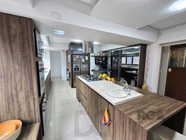 Apartamento em Porto Alegre, no bairro Auxiliadora, com 4 dormitório(s), e 4 banheiros, à venda. — foto 3