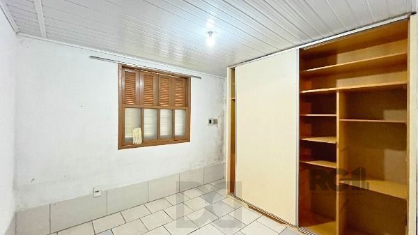 Casa em Porto Alegre, no bairro Guarujá, com 2 dormitório(s), e 2 banheiros, à venda. — foto 24
