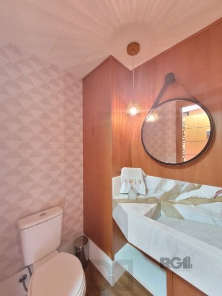 Apartamento em Porto Alegre, no bairro Cavalhada, com 3 dormitório(s), e 3 banheiros, à venda. — foto 4