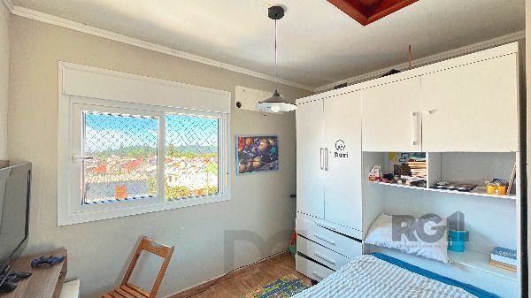 Casa em Porto Alegre, no bairro Guarujá, com 3 dormitório(s), e 3 banheiros, à venda. — foto 30