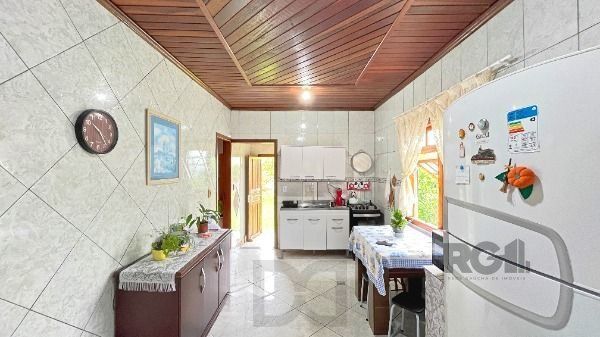 Casa em Porto Alegre, no bairro Lageado, com 3 dormitório(s), e 3 banheiros, à venda. — foto 12