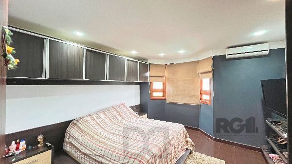Casa em Porto Alegre, no bairro Hípica, com 3 dormitório(s), e 3 banheiros, à venda. — foto 31