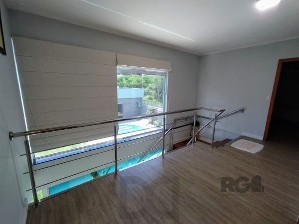 Casa em Porto Alegre, no bairro Hípica, com 3 dormitório(s), e 3 banheiros, à venda. — foto 18