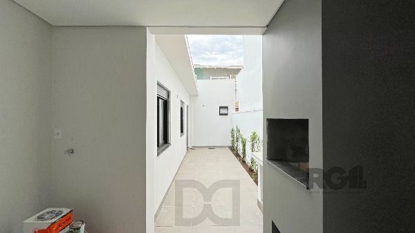 Casa em Porto Alegre, no bairro Hípica, com 3 dormitório(s), e 3 banheiros, à venda. — foto 24