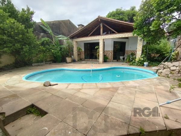 Casa em Porto Alegre, no bairro Ipanema, com 6 dormitório(s), e 6 banheiros, à venda. — foto 3