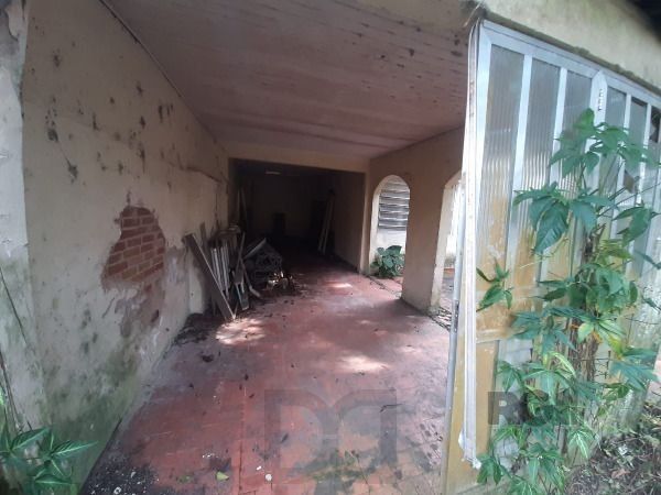 Casa em Porto Alegre, no bairro Cristal, com 4 dormitório(s), e 4 banheiros, à venda. — foto 24