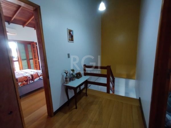 Casa em Porto Alegre, no bairro Hípica, com 3 dormitório(s), e 3 banheiros, à venda. — foto 12