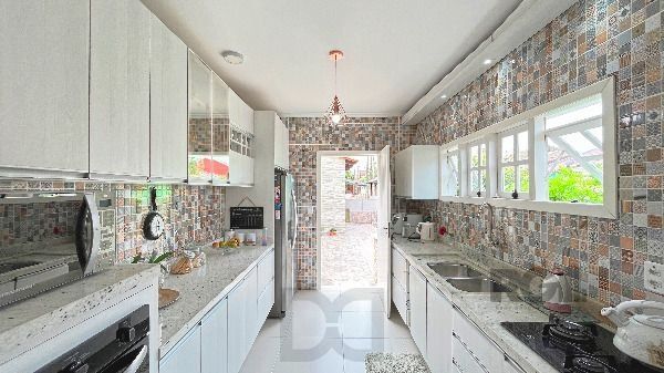 Casa em Porto Alegre, no bairro Hípica, com 2 dormitório(s), e 2 banheiros, à venda. — foto 13
