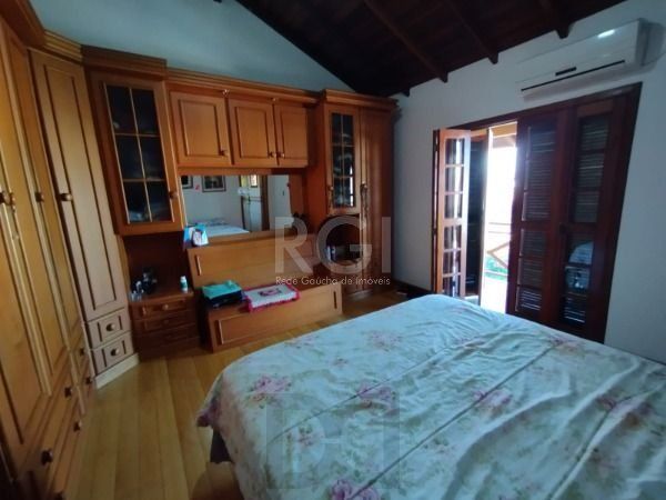 Casa em Porto Alegre, no bairro Hípica, com 3 dormitório(s), e 3 banheiros, à venda. — foto 21