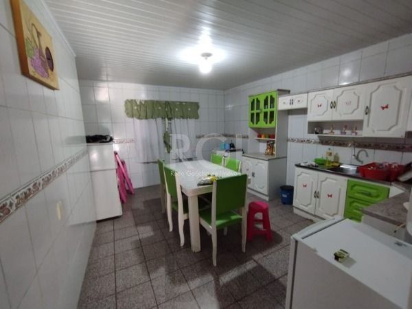 Casa em Porto Alegre, no bairro Belém Novo, com 5 dormitório(s), e 5 banheiros, à venda. — foto 26