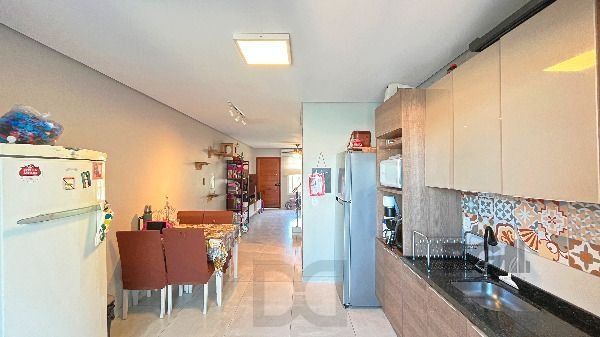 Casa em Porto Alegre, no bairro Guarujá, com 3 dormitório(s), e 3 banheiros, à venda. — foto 12