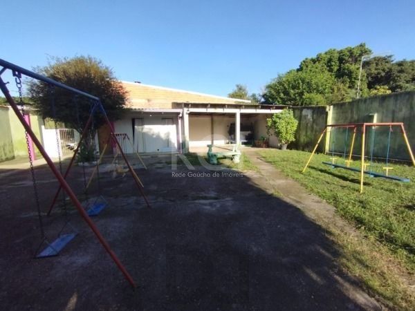 Casa em Porto Alegre, no bairro Belém Novo, com 5 dormitório(s), e 5 banheiros, à venda. — foto 14