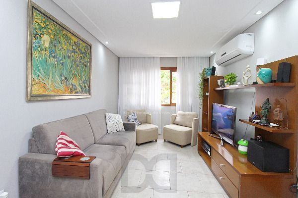 Casa em Porto Alegre, no bairro Hípica, com 3 dormitório(s), e 3 banheiros, à venda. — foto 9